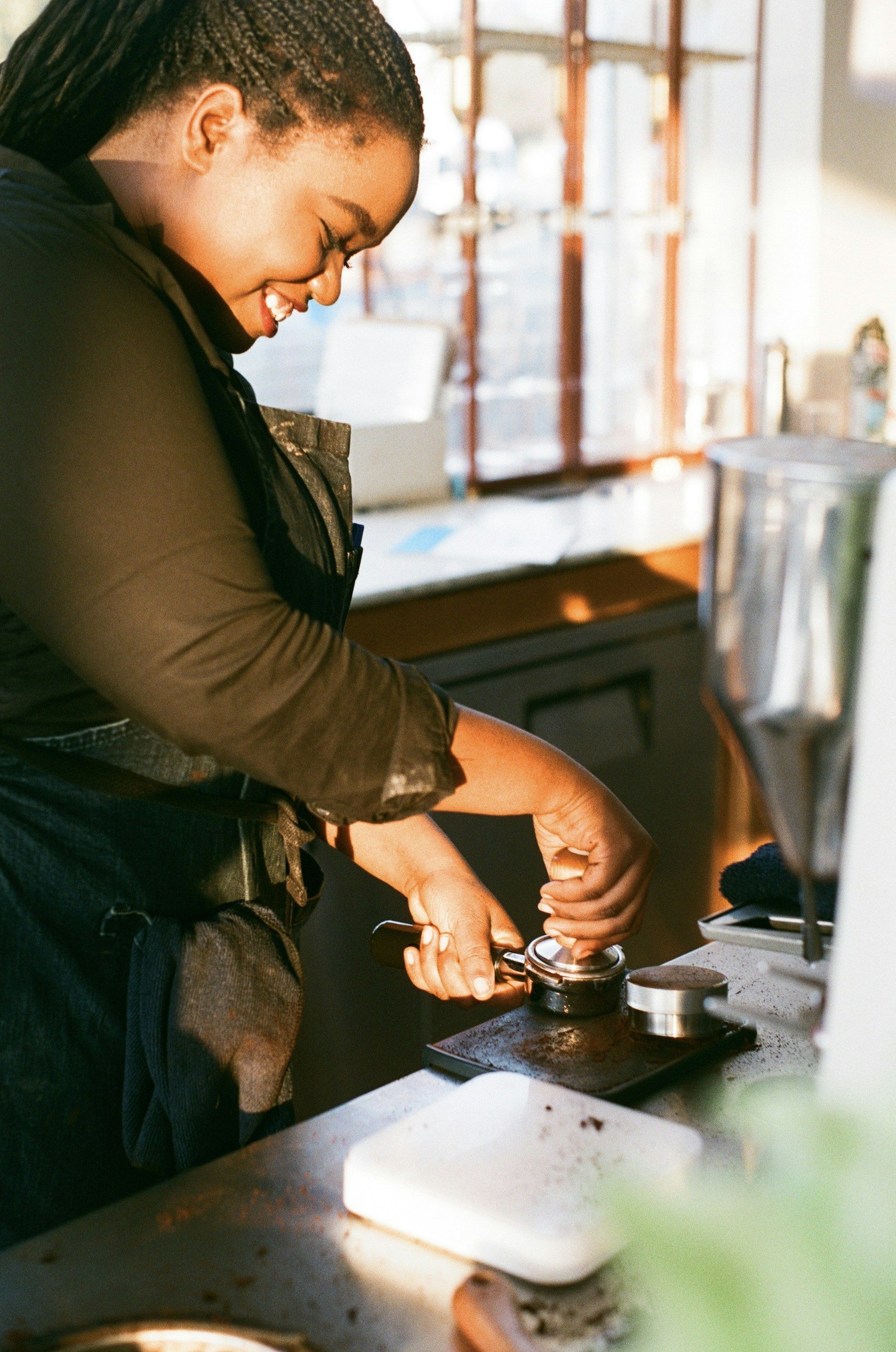A barista in a busy café