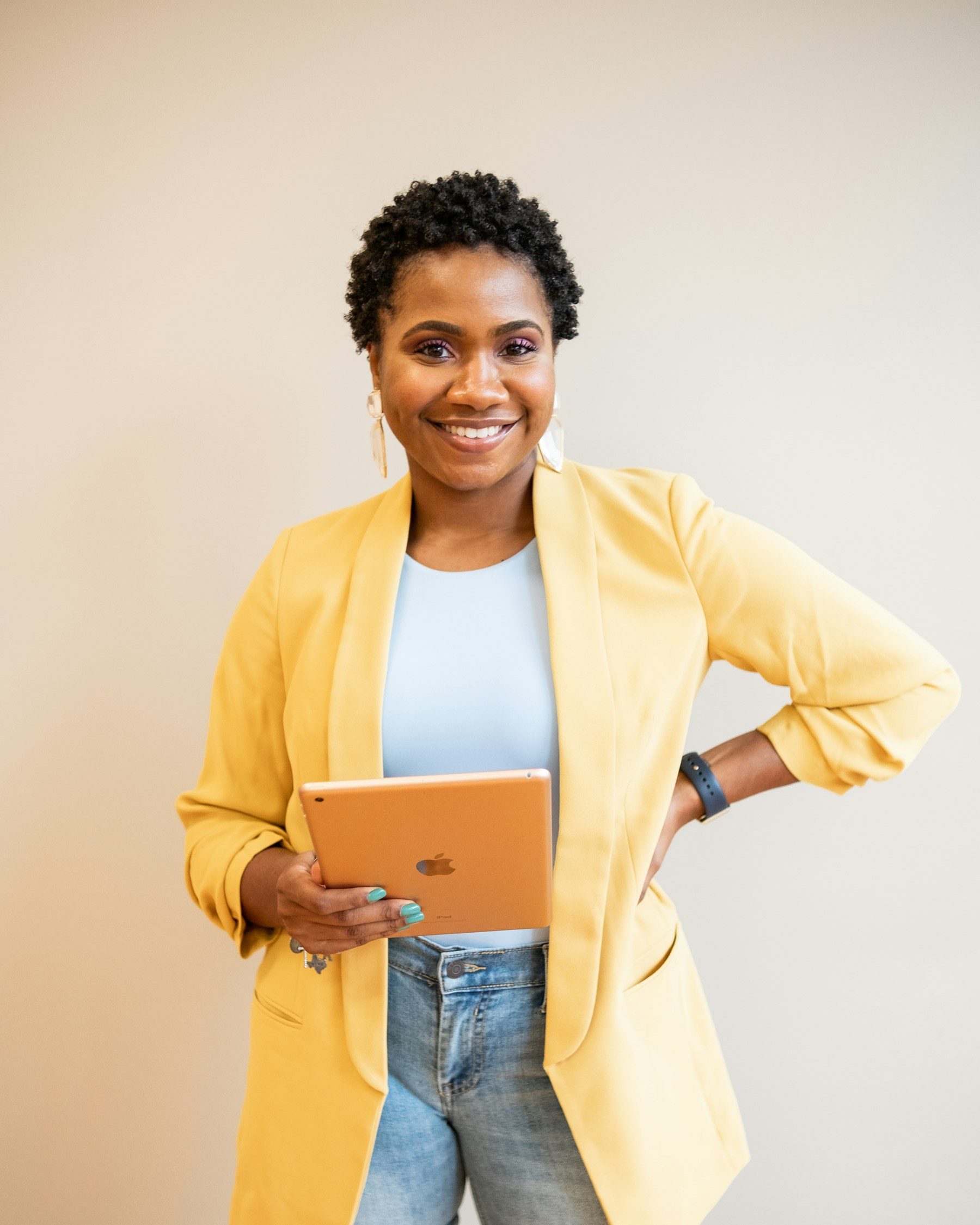 A customer care manager with a tablet