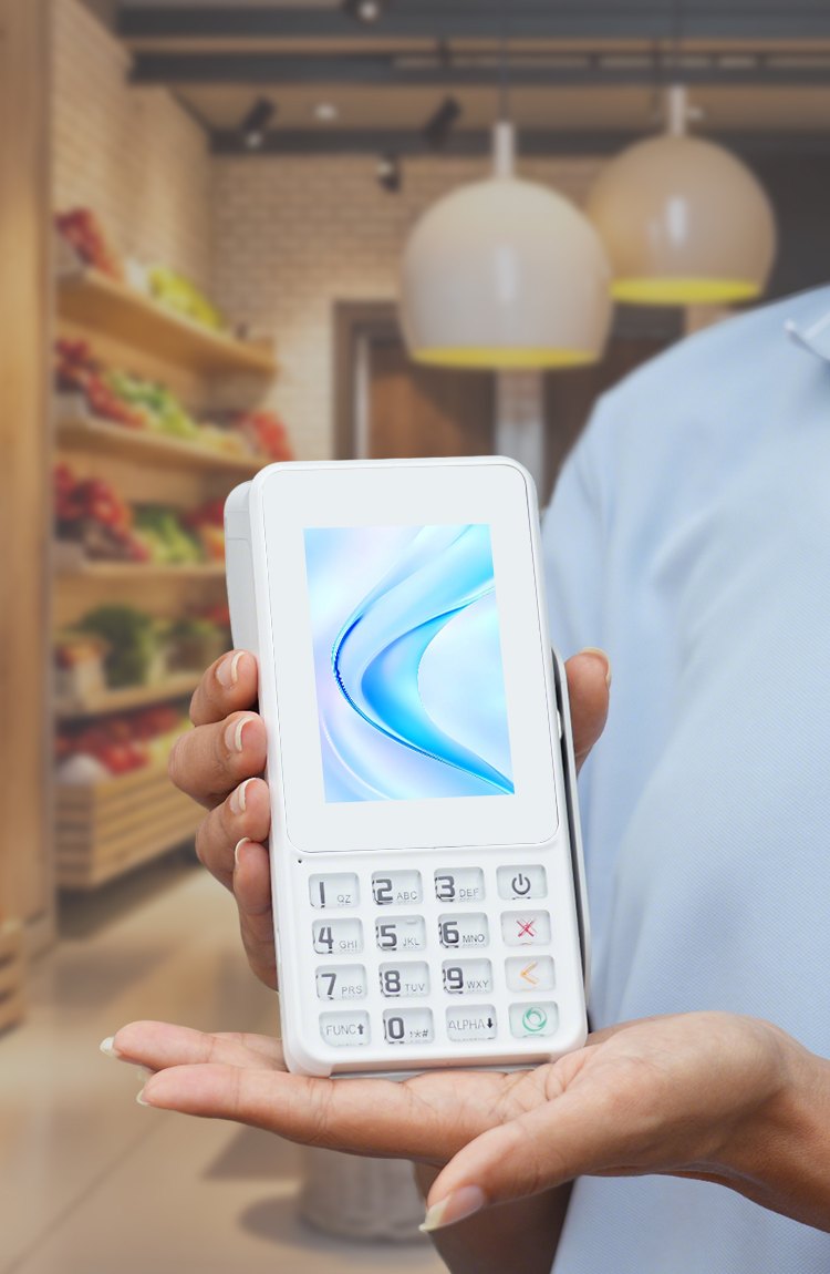 The CSwitch POS terminal, an Android Urovo i5300, held out in a shop